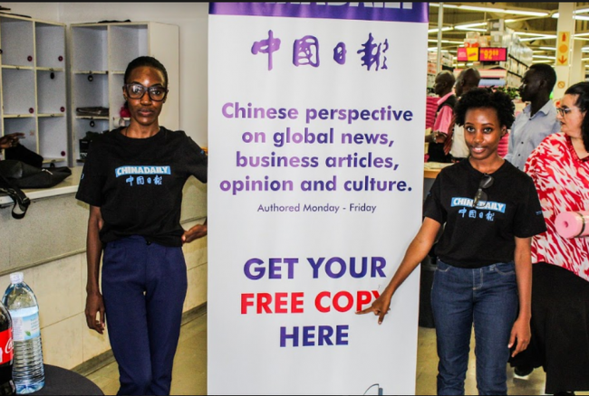 Capture34 The Newz Point team takes part in distribution marketing for one of its partners, China Daily at Game Stores in Kampala.